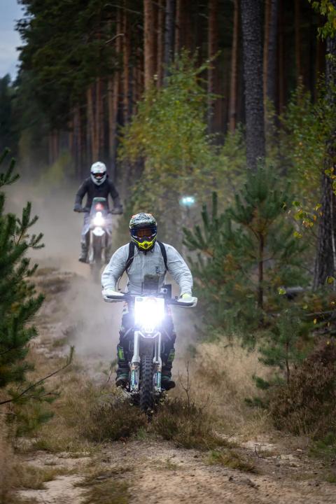 A motorcycle rider travelling along a sandy forest trail – Alakonnu Rally 2025